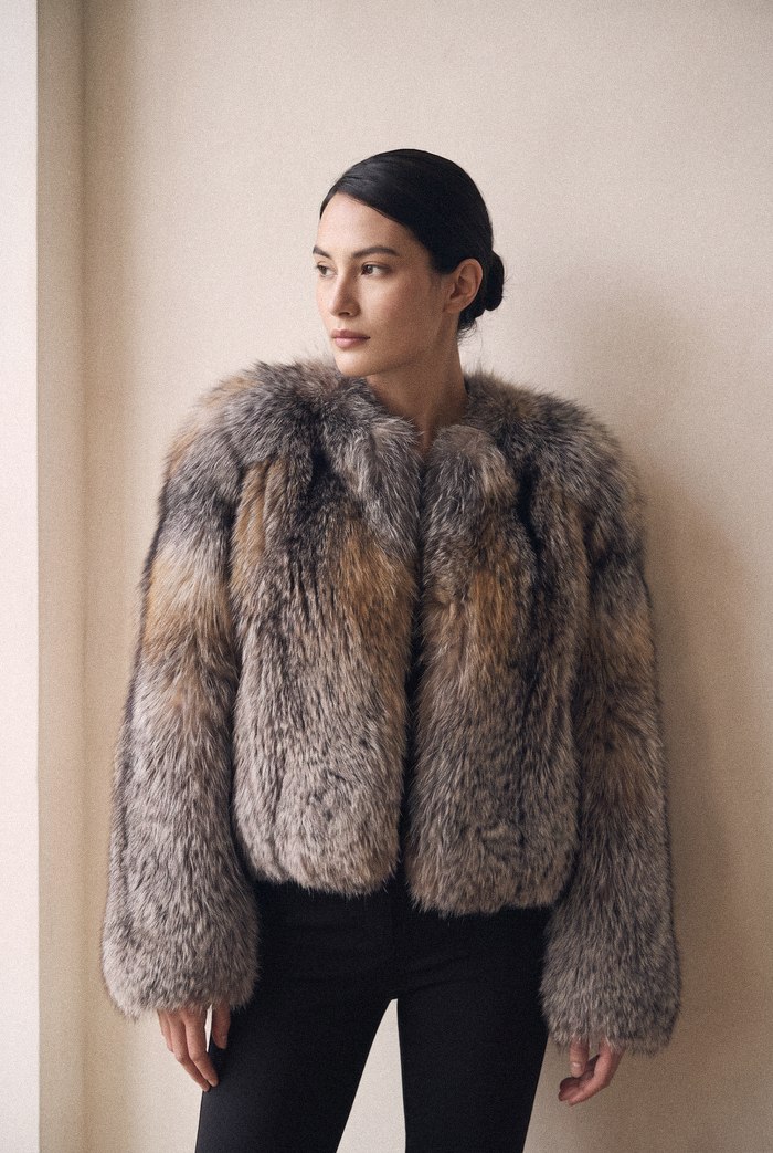 Collarless fox jacket, worn