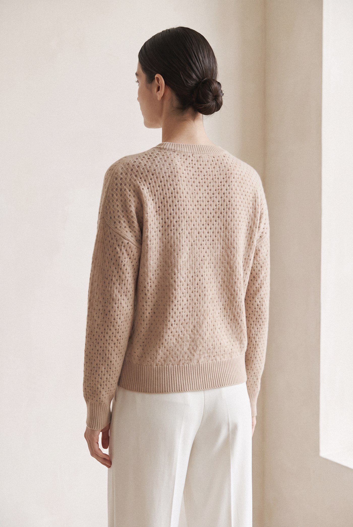 Style 23760 beige open-stitch crewneck, back view