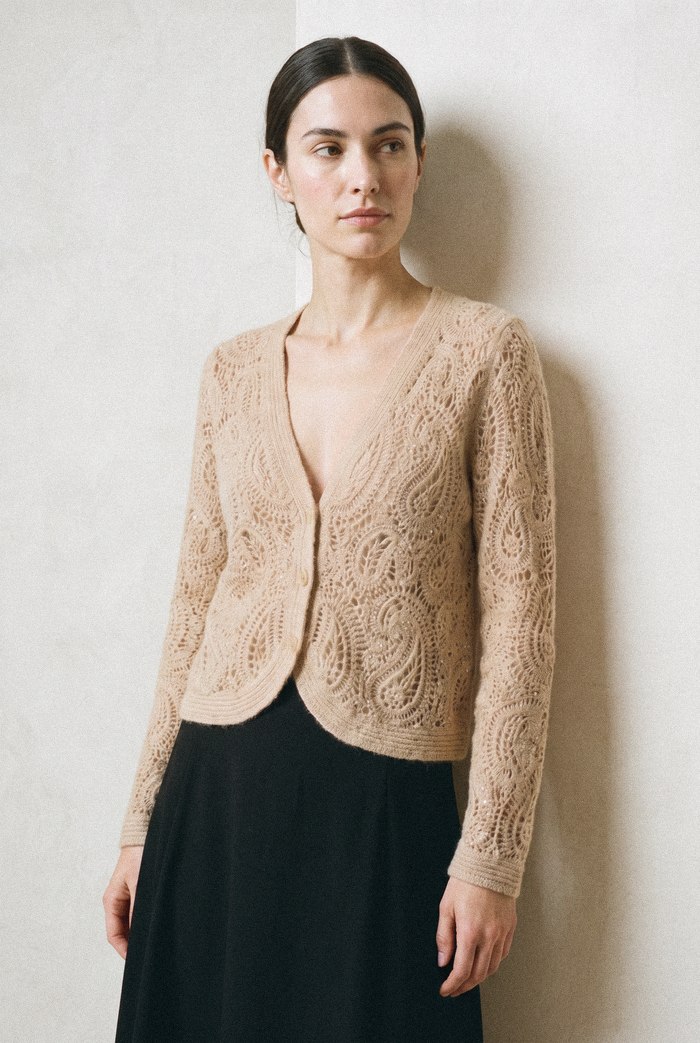 Crochet paisley cardigan in beige, worn