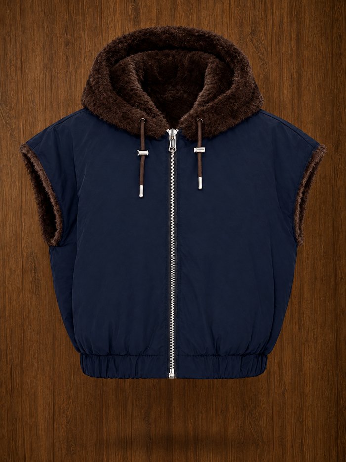 Reversible faux fur gilet, reversed to the navy nylon side