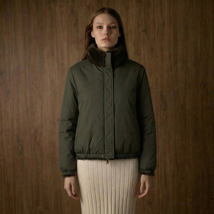 Reversible faux fur jacket in army green, worn