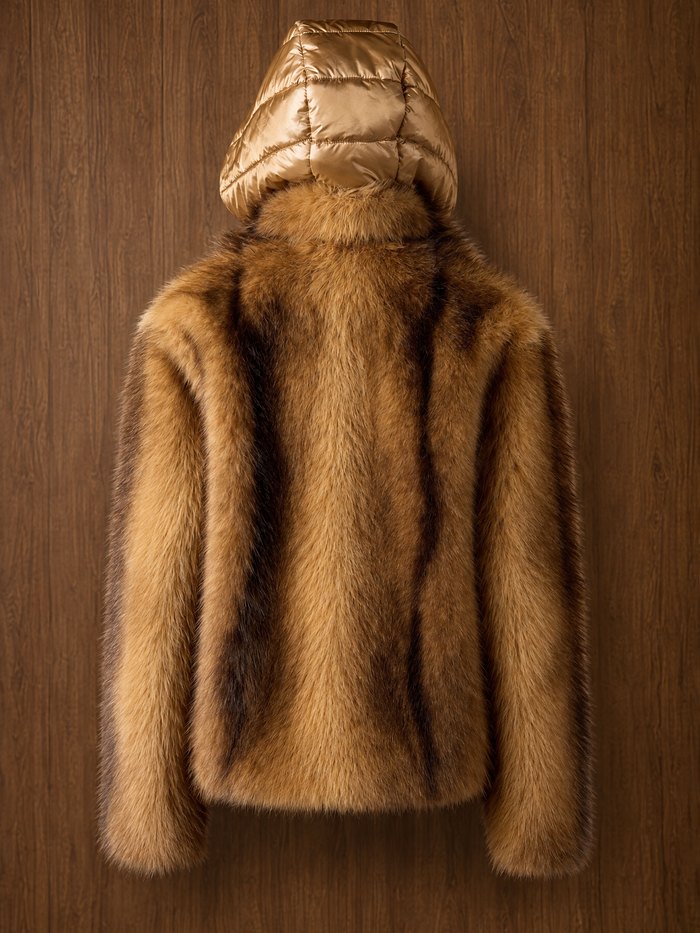 Faux fur jacket in camel with the gold puffer hood up, back view
