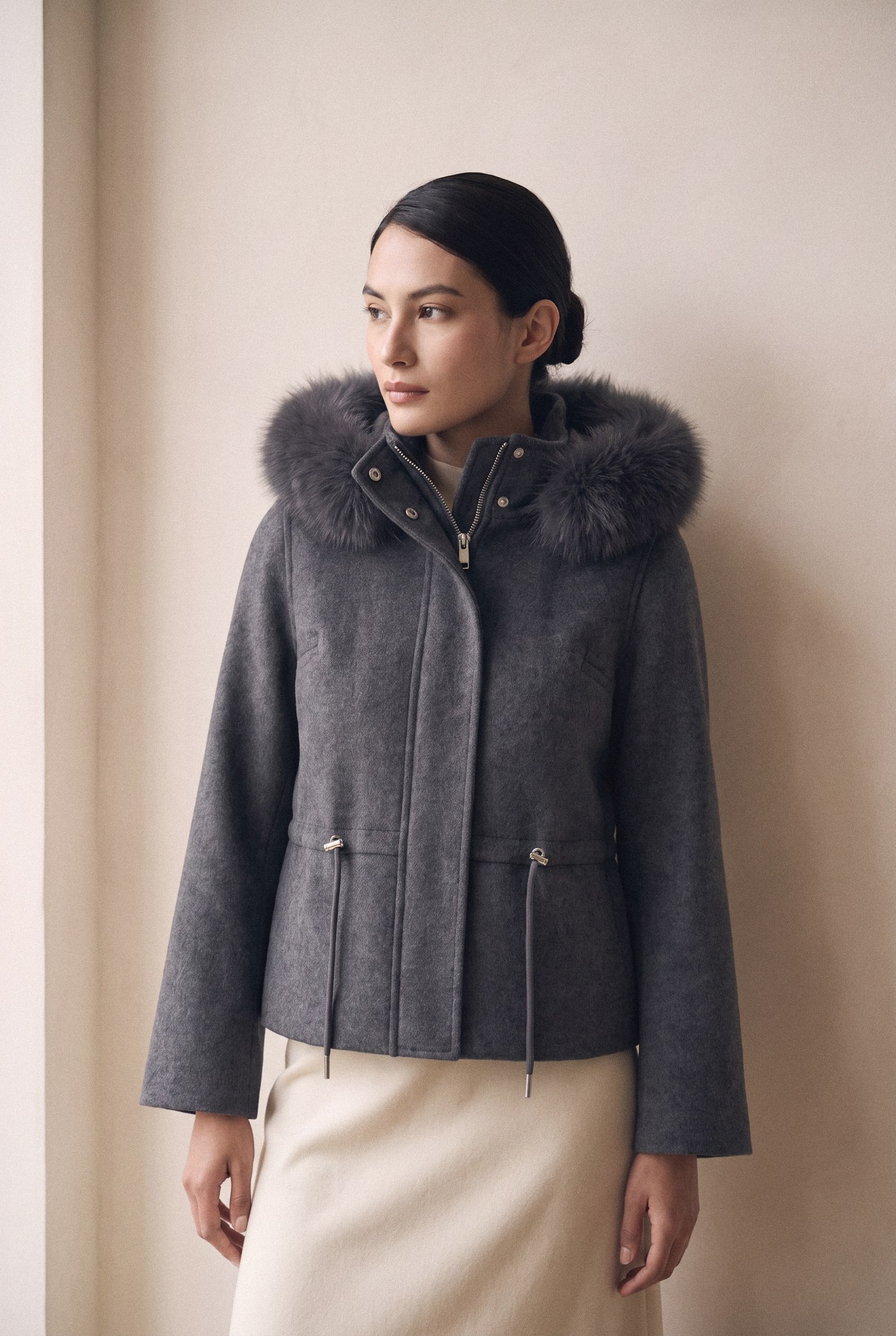 Style VICTORIA grey mini parka with fox-trimmed hood, front